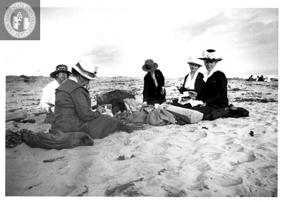 Picnic at the beach, circa 1900