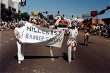 "Hillcrest Barber Salon" banner in Pride parade, 1999