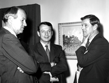 Lionel Van Deerlin standing with two unidentified men