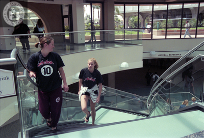 Students climb stairs in the Infodome, 1996