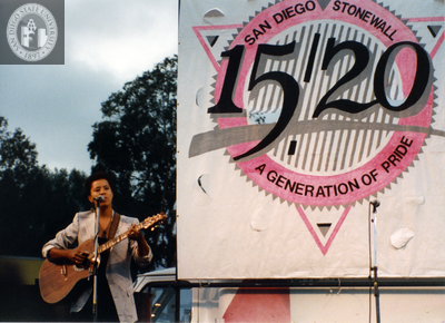 Deidre McCalla plays guitar at Pride Festival, 1989