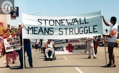 "Stonewall means Struggle" banner in Pride parade, 1999