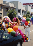 Miss California at Large in parade car in Pride parade, 1998