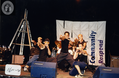 Festival group performing onstage at Pride Festival, 2000