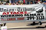 Union-Tribune protest banner at Pride parade lineup, 1999