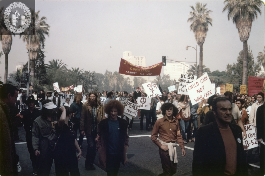 Los Angeles antiwar march crosses Alvarado Street, 1971
