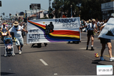 "Rainbow Riders/Ride with Pride" banner at Pride parade, 1997