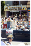 Christine Kehoe waves from the back of convertible at Pride parade, 1998