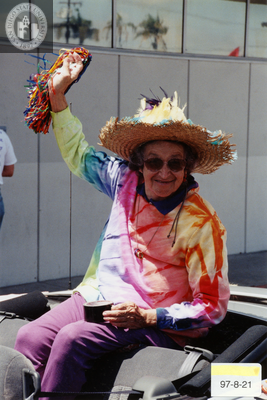 Person in a tie-dye shirt at the Pride parade, 1997