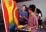 Student painter and instructor with painting, 1996
