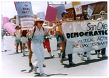 Jeri Dilno holding sign for San Diego Democratic Club, 1988