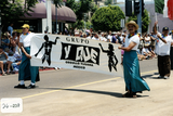 "Grupo Y Que" banner in Pride parade, 2000