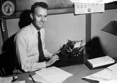 Lionel Van Deerlin at a manual typewriter