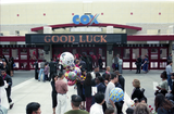 Graduates and families in front of Cox Arena, 1999