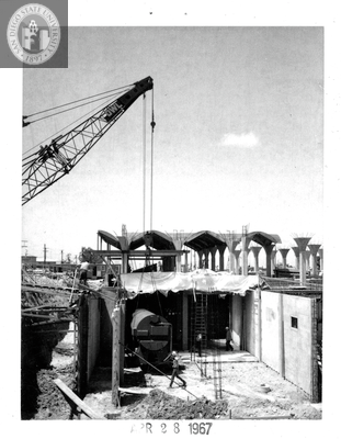 Setting chiller unit, Aztec Center construction, 1967