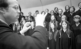 Chorus led by an unidentified director