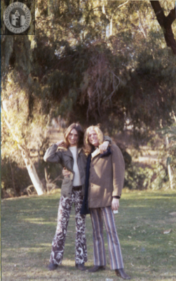 People pose in sideways hug for San Diego Gay-In II in Balboa Park, 1971