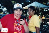 Cheli Mohamed and Robin Wilson hold walkie talkies, 1999