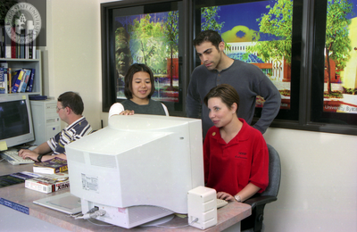 Students watch computer monitor, 1999
