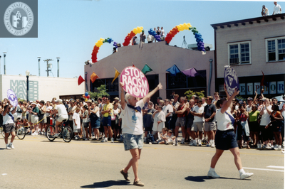 "Stop Racism Now" sign in Pride parade, 1999