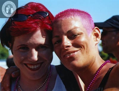 Women with pink and red hair at Pride Festival, 2001
