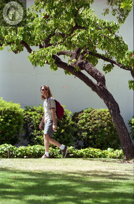 Student on path on campus, 1996