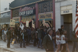 Anltiwar demonstrators in front of Pekin Cafe on University Avenue, 1971