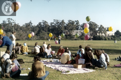 People on a lawn at San Diego Gay-In II in Balboa Park, 1971