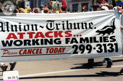 Union-Tribune protest banner at Pride parade lineup, 1999