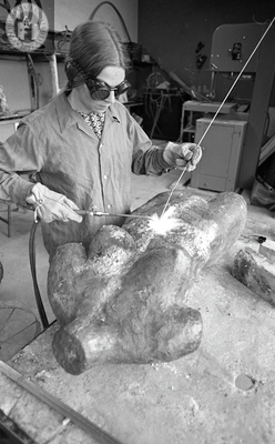 Artist welds a sculpture
