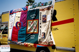 AIDS Quilt display on Ryder truck at Pride parade, 1998