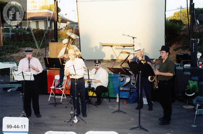 Band on stage at Pride rally, 1999