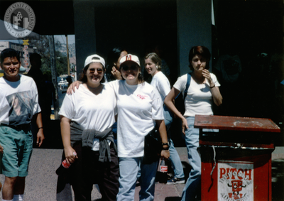 Women pose for picture at Tijuana Pride parade, 1996