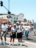 PFLAG marchers holding "We Love Our Gay Son" sign at Pride parade, 1998