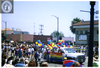 Truck and "San Diego Women's Chorus" banner in Pride parade, 1998
