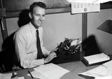 Lionel Van Deerlin at a manual typewriter