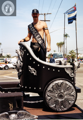 Mr. San Diego Eagle in chariot on a Pride parade float, 1996