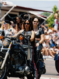 Women in leather outfits on motorcycle in Pride parade, 2001