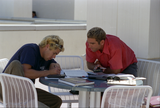 Students at table at Aztec Center, 1996