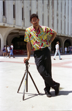 A photographer photographed at the library, 1996