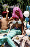 People in mermaid costumes in Pride parade, 2000