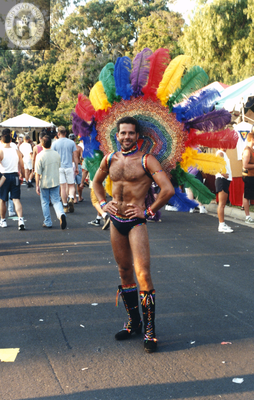 Man in rainbow colors during Pride parade, 1996