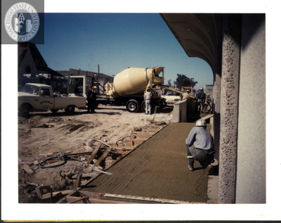 Pouring walks, south side, Aztec Center construction, 1968