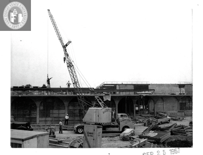 Delivering roof deck, Aztec Center construction, 1967