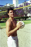 Student with volleyball and net, 1996