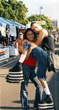 Two individuals hugging at Pride Festival, 2001