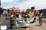 Bears San Diego banner with paw print in Pride parade, 2000