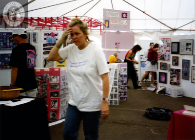 Debbie Zeyher in Lambda Archives tent at Pride festival