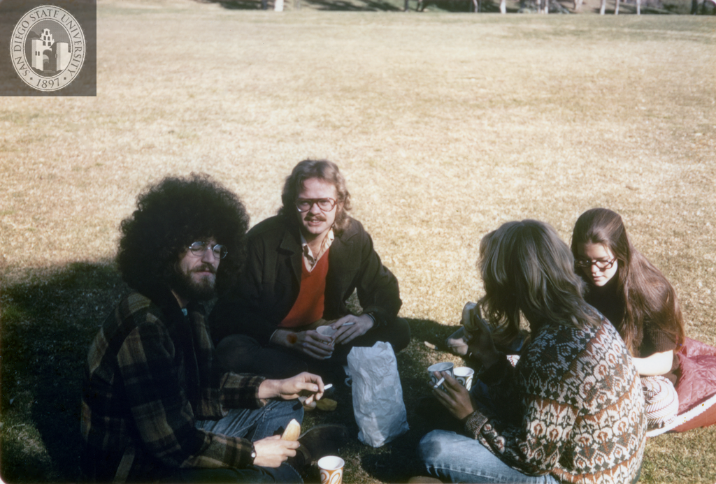 Four people at San Diego Gay-In II in Balboa Park, 1971