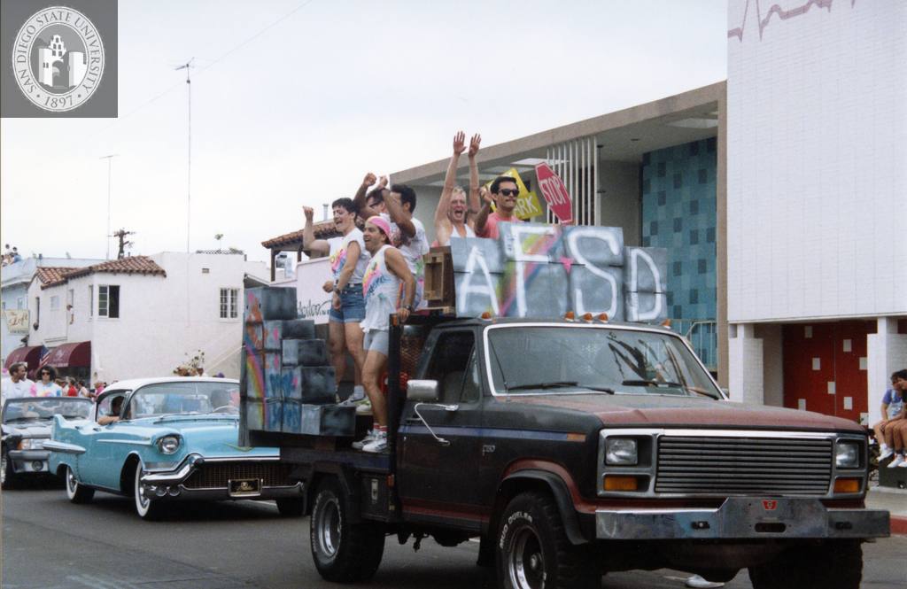 The AIDS Foundation of San Diego float heads a line of parade cars, 1991